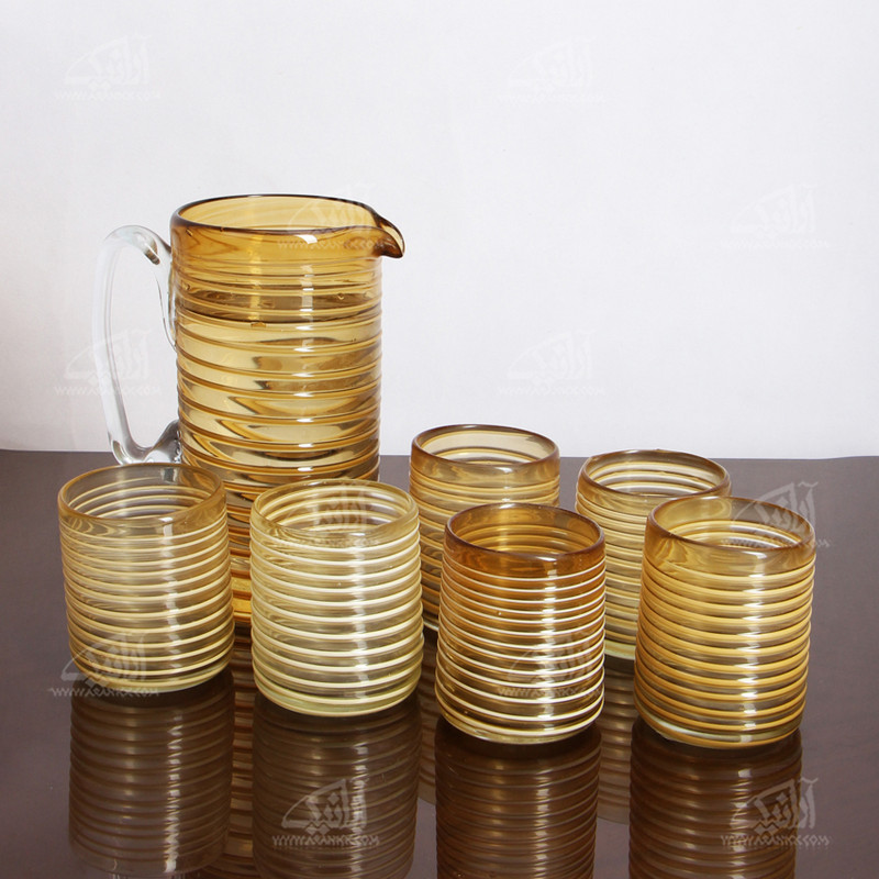 ست پارچ و لیوان شیشه گری فوتی ساده زرد طرح موج مدل 1020500001