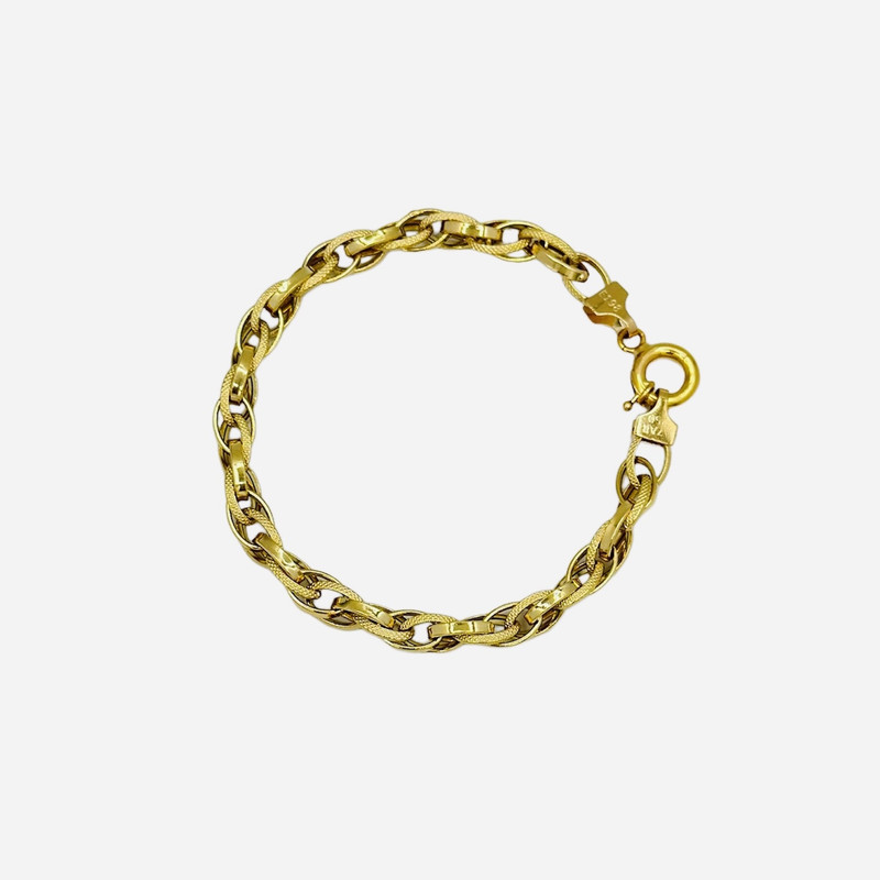 دستبند طلا 18 عیار زنانه طلای کامک مدل بافت