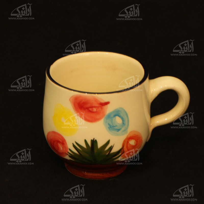 لیوان سفالی آرانیک دسته دار نقاشی زیر لعابی رنگ کرمی طرح گل مدل 1002900023