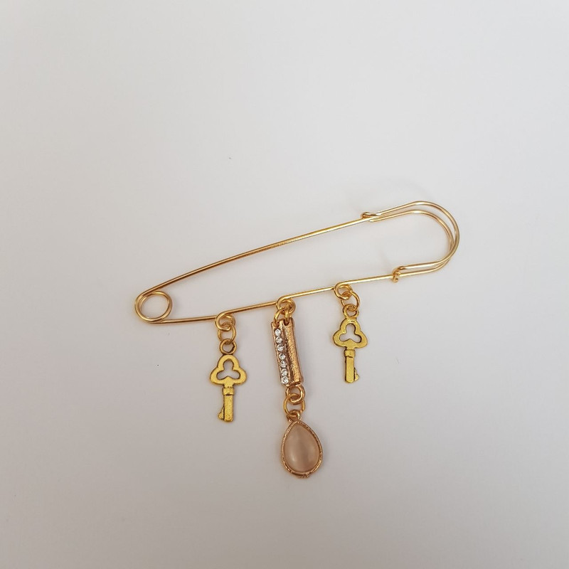 خرید و قیمت سنجاق سینه زنانه مدل کلید